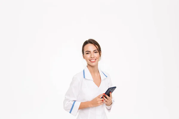 Confident Young Woman Doctor Wearing Uniform Standing Isolated White Background — Stock Photo, Image