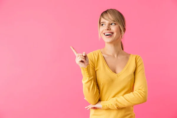 Cheerful Young Blonde Woman Pointing Finger Away Copy Space Isolated — Stock Photo, Image