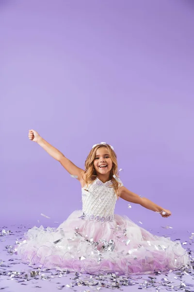 Pretty Little Girl Dressed Princess Dress Sitting Isolated Violet Background — Stock Photo, Image