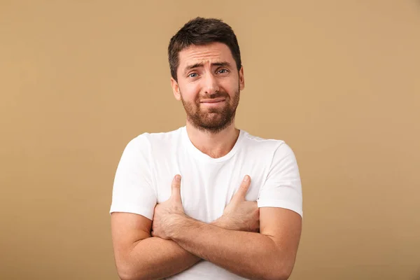 Portrait Confused Young Man Casually Dressed Standing Isolated Beige Background — Stock Photo, Image