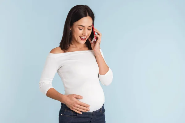 Foto Ung Gravid Kvinna Som Isolerade Över Blå Vägg Bakgrund — Stockfoto