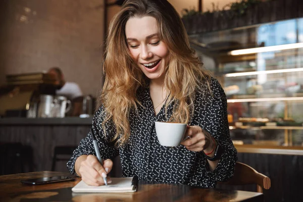 Photo Beautiful Young Pretty Woman Sitting Cafe Indoors Writing Notes — Stock Photo, Image