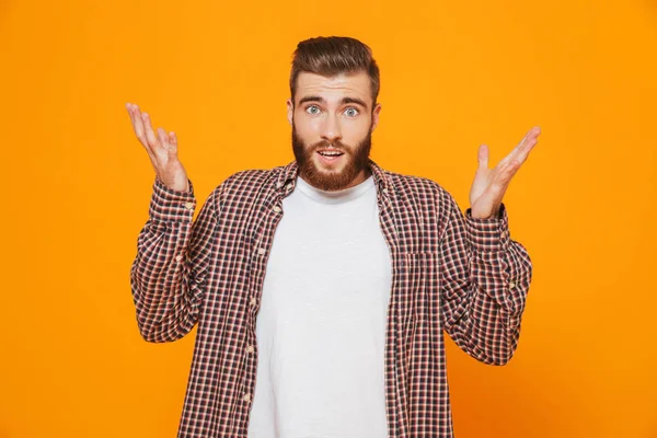 Portrait Confused Young Man Wearing Casual Clothes Standing Isolated Yellow — Stock Photo, Image