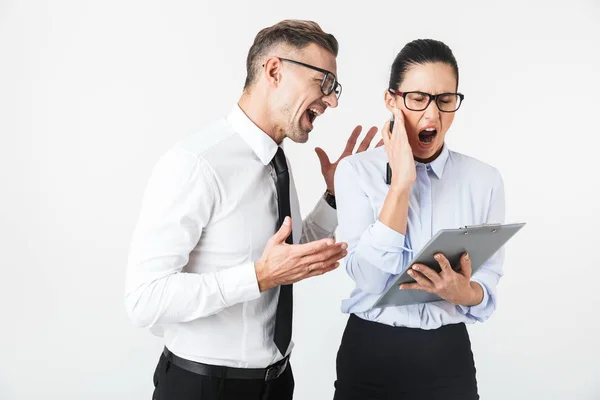 Couple Mad Colleagues Wearing Formal Clothing Standing Isolated White Background — Stock Photo, Image