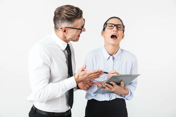 Couple Mad Colleagues Wearing Formal Clothing Standing Isolated White Background — Stock Photo, Image