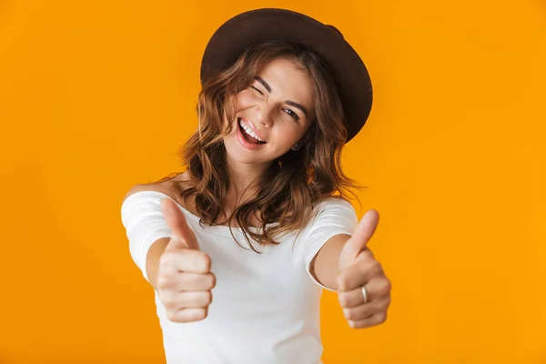 Portrait of a cheerful young woman wearing white shirt — Stock Photo, Image