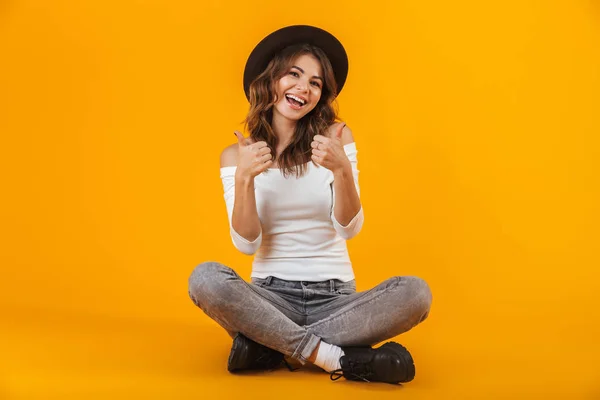 Portrait of a cheerful young woman wearing white shirt — Stock Photo, Image