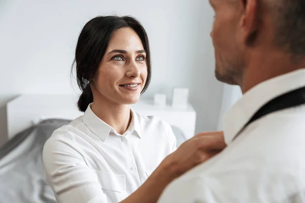 Woman help to her husband boyfriend with tie formal clothes indoors at home. — Stock Photo, Image