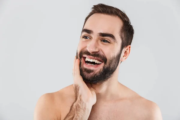 Acercamiento de un joven guapo barbudo sin camisa —  Fotos de Stock