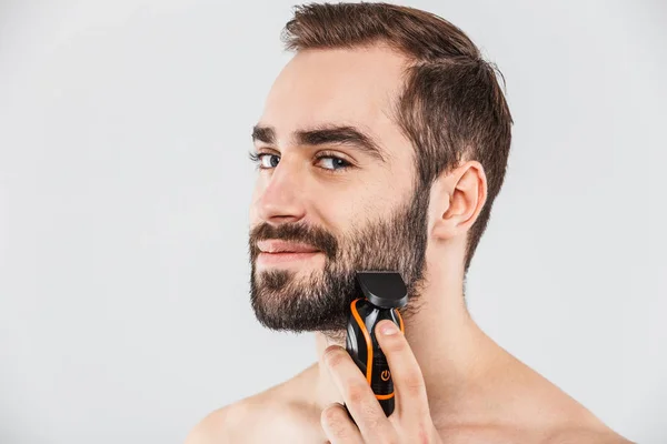 Retrato de cerca de un hombre barbudo guapo —  Fotos de Stock