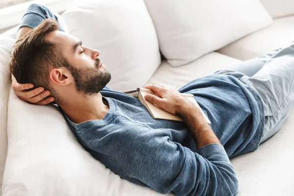 Attractive young man relaxing — Stock Photo, Image