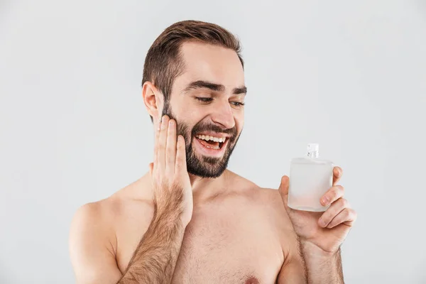 Portrait of a cheerful shirtless bearded man — Stock Photo, Image