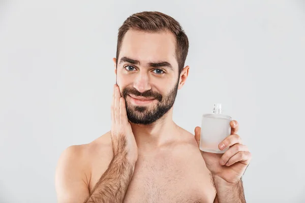 Portrait of a cheerful shirtless bearded man — Stock Photo, Image