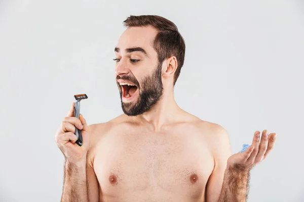 Portrait of a cheerful shirtless bearded man — Stock Photo, Image