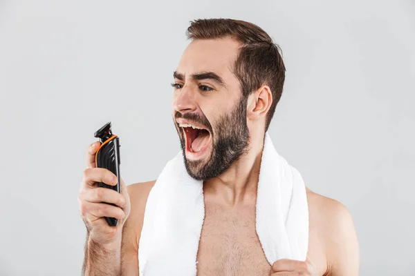 Portrait of a cheerful shirtless bearded man — Stock Photo, Image