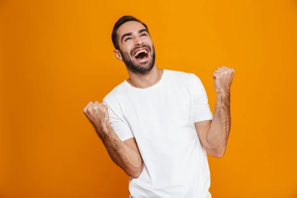 Imagem de homem alegre 30 anos com barba e bigode apertando punho — Fotografia de Stock