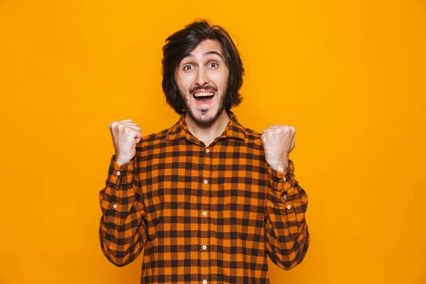 Portret van gelukkig man dragen van de plaid shirt vreugde en clenchin — Stockfoto