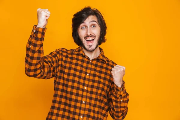 Portret van vrolijke man dragen van de plaid shirt vreugde en clenchi — Stockfoto