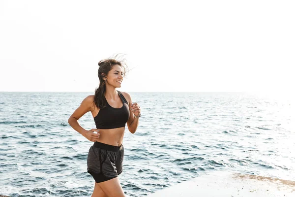 Säker ung idrotts man kvinna jogging — Stockfoto