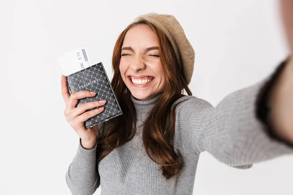 Portrait of ecstatic woman 30s wearing hat holding passport and — Stock Photo, Image