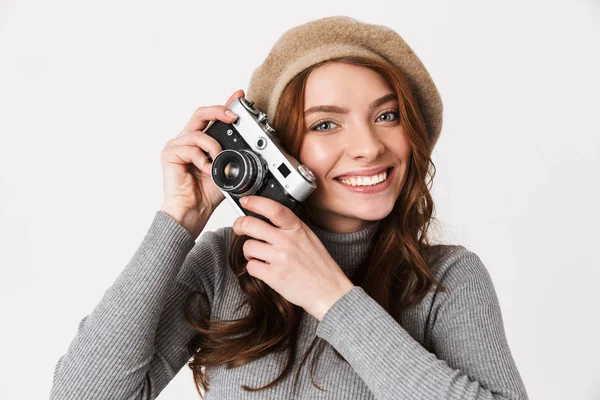 Photo of pretty woman 30s wearing hat smiling and holding retro — Stock Photo, Image