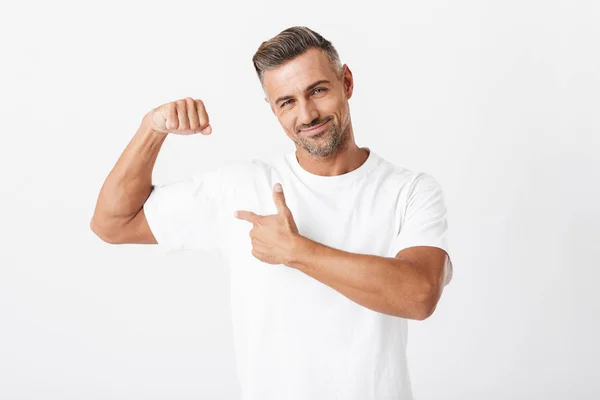 Image of happy man 30s with bristle wearing casual t-shirt showi — Stock Photo, Image