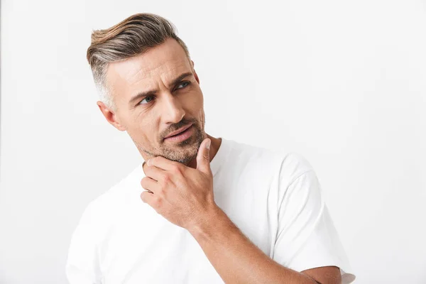 Handsome pensive casual man standing — Stock Photo, Image