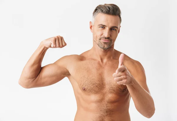 Confident handsome shirtless man standing isolated — Stock Photo, Image