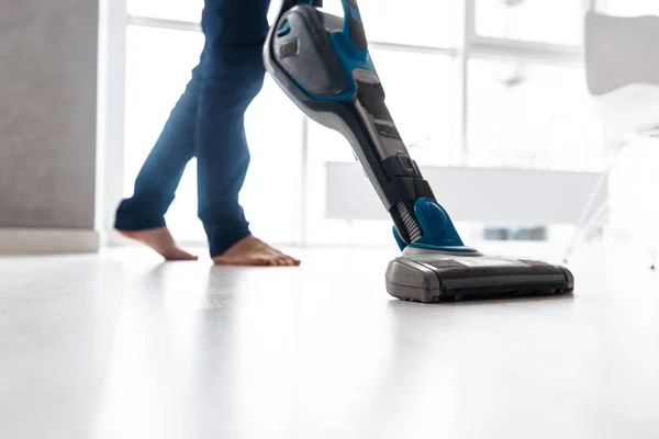 Close up of a man vacuuming — Stock Photo, Image