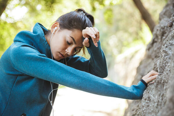 Close up of an attractive young fitness woman