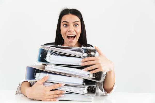 Photo of excited brunette businesswoman 30s working and sitting — Stock Photo, Image