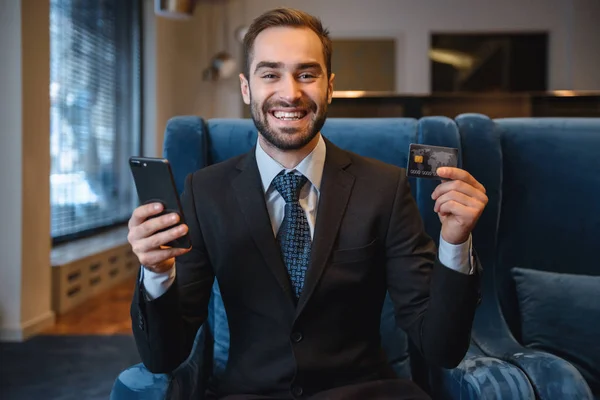 Handsome young businessman wearing suit — Stock Photo, Image