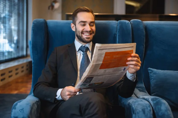 Handsome pensive young businessman wearing suit — Stock Photo, Image