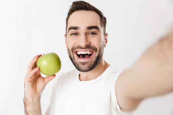 Handsome cheerful man wearing blank t-shirt — Stock Photo, Image