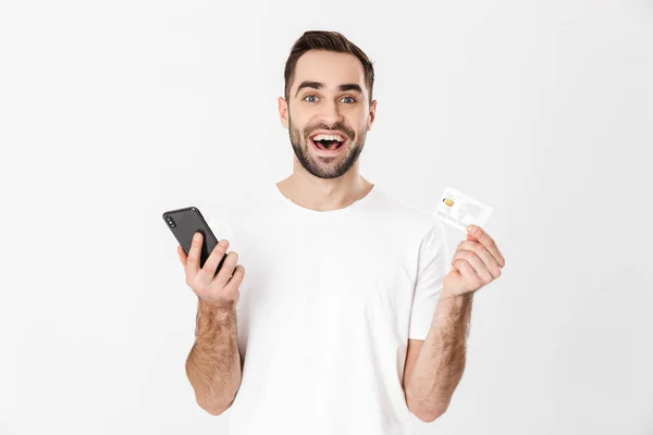 Knappe vrolijke man draagt blank t-shirt — Stockfoto