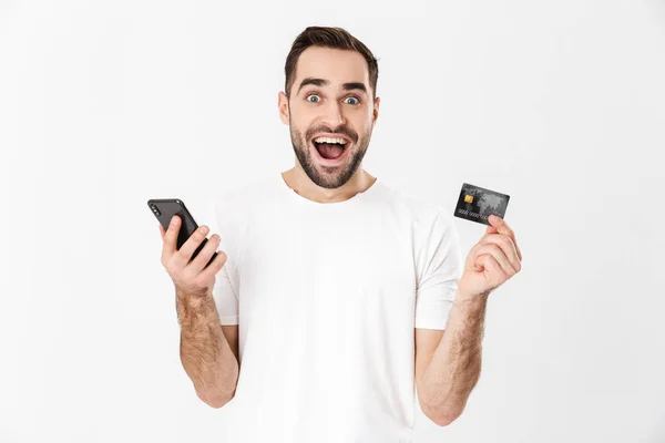 Bonito homem alegre vestindo camiseta em branco — Fotografia de Stock