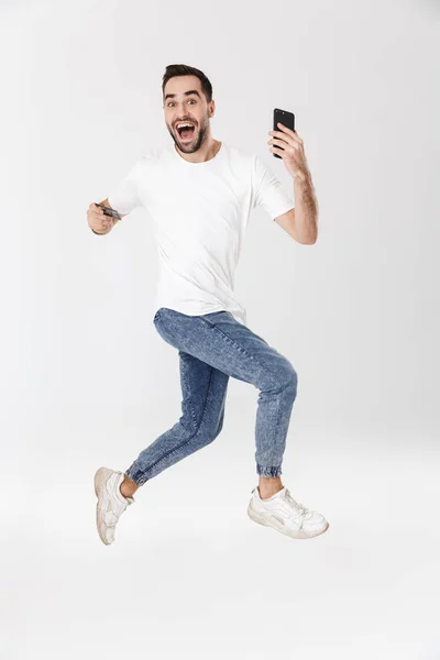 Largura completa iof un hombre alegre guapo —  Fotos de Stock