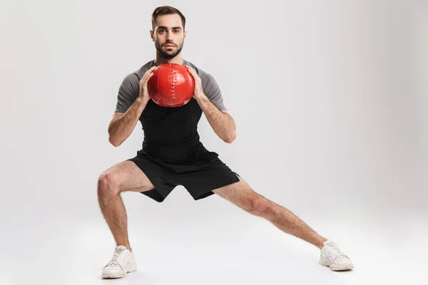 Selbstbewusster motivierter Sportler bei Übungen — Stockfoto