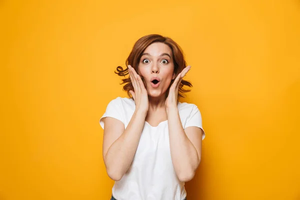 Cheerful young girl wearing t-shirt standing — Stock Photo, Image