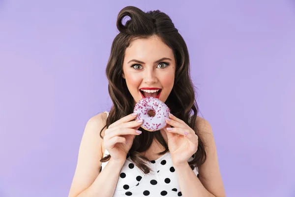 Photo of joyful pin-up woman 20s in vintage polka dot dress smil