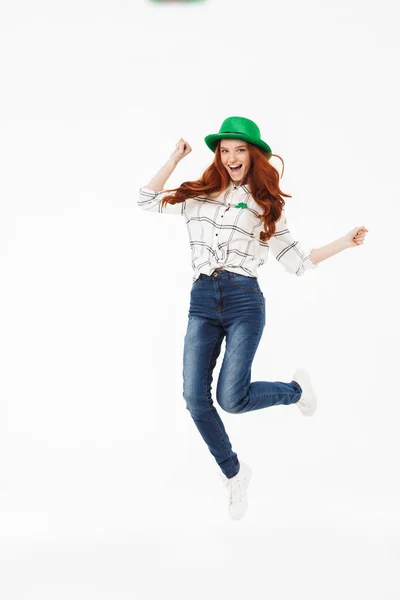 Happy young redheaded girl wearing green hat — Stock Photo, Image