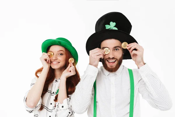 Happy young couple wearing costumes, celebrating — Stock Photo, Image