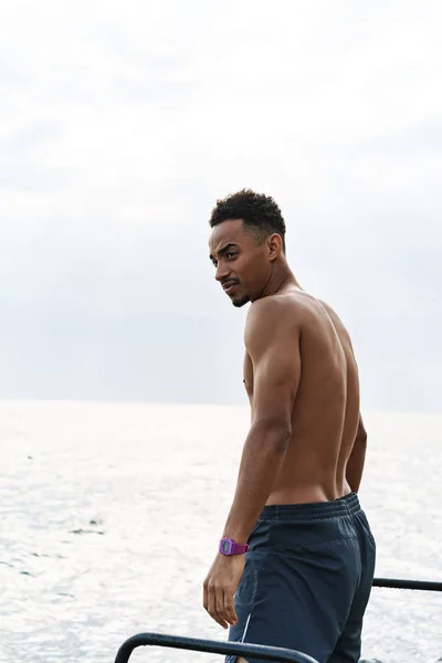 Young african sports man outdoors at the beach sea. — Stock Photo, Image