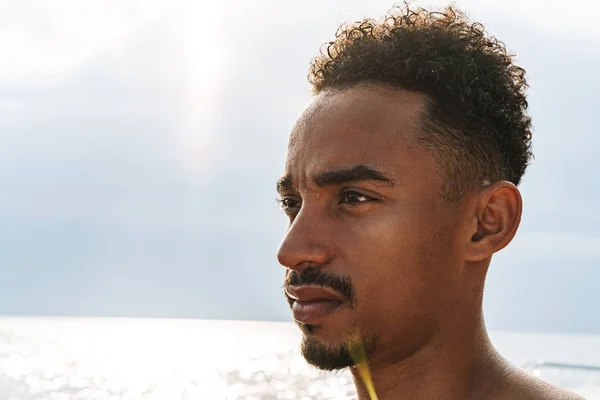 Young african sports man outdoors at the beach sea. — Stock Photo, Image