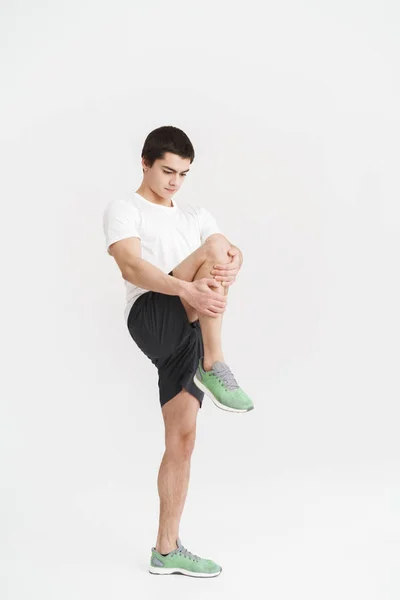 Volledige lengte portret van een gezonde fit jonge sportman — Stockfoto