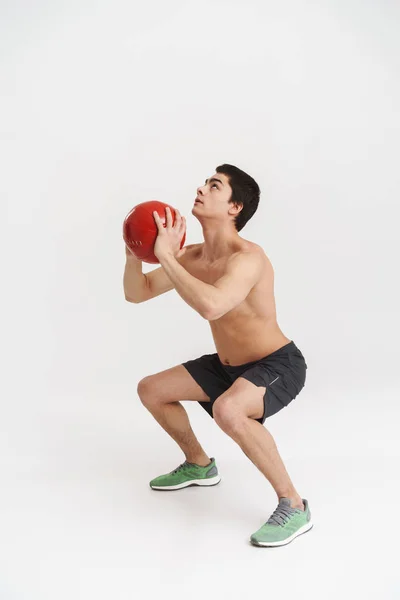 Volle Länge eines selbstbewussten jungen Sportlers ohne Hemd — Stockfoto