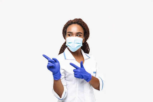 Image of brunette african american nurse or doctor woman wearing