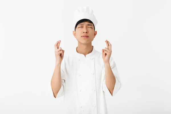 Excited asian chef wearing uniform standing — Stock Photo, Image