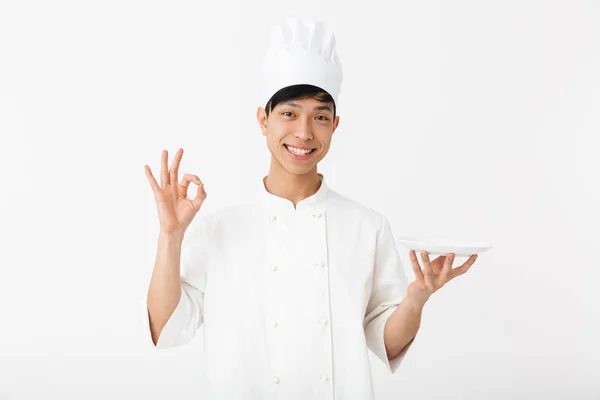 Image of asian candid chief man in white cook uniform smiling at — Stock Photo, Image