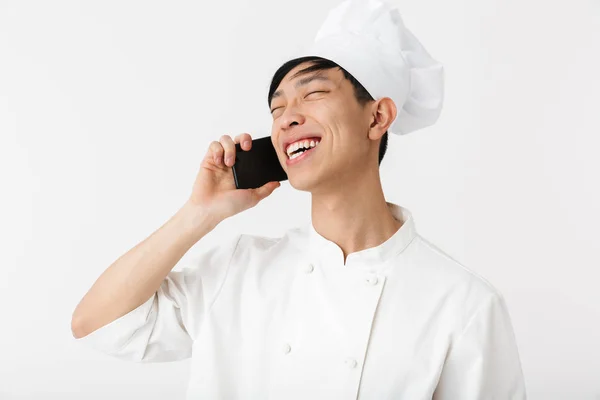 Imagem do tipo chinês chefe homem em branco cozinheiro uniforme e chef de — Fotografia de Stock